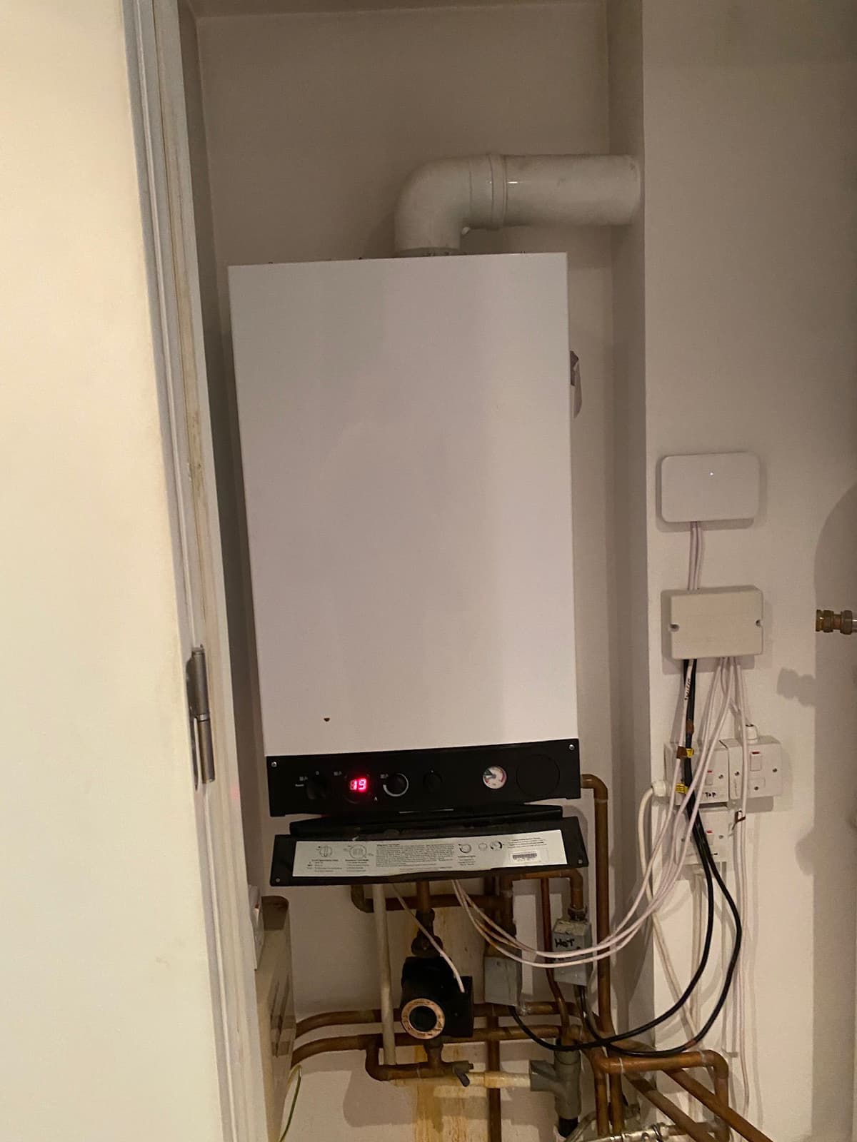 Professional boiler installation with flue routing in Finchley property